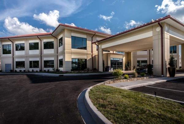 Exterior photo of main covered entrance to the 27,300 sq foot office building