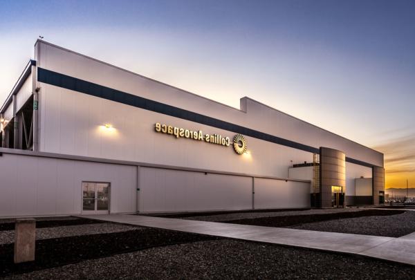 Front of Collins Aerospace facility at sunset